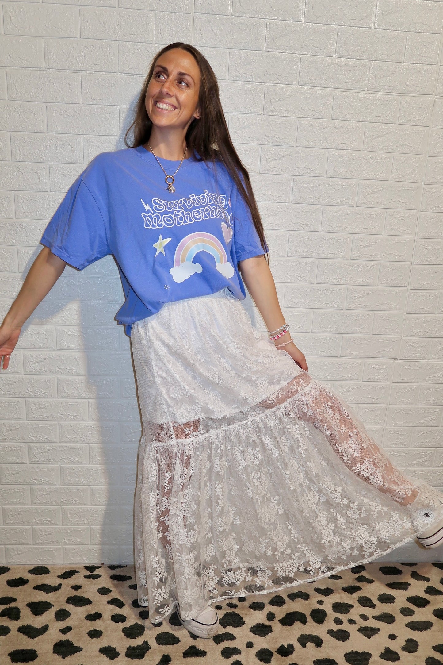 surviving motherhood graphic tee